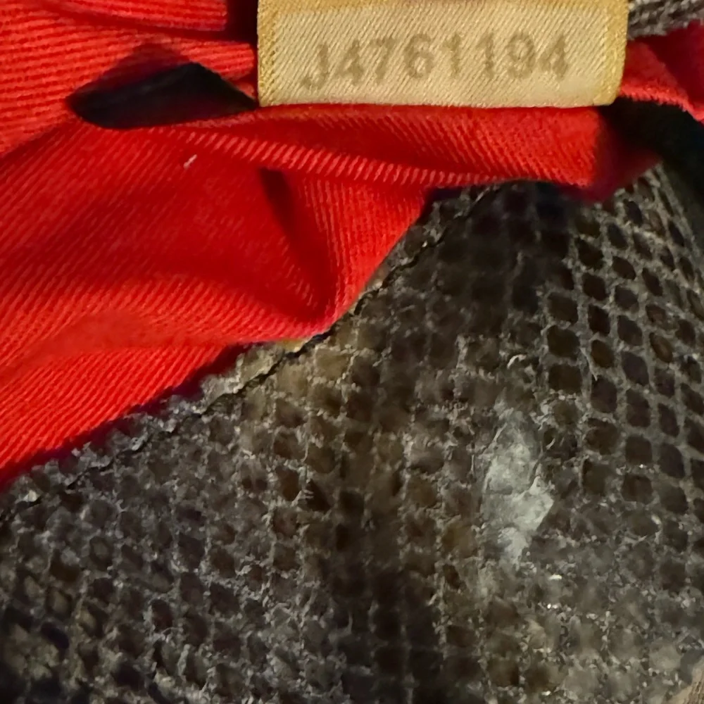 Dooney & Bourke “snakeskin” leather hobo shoulder bag